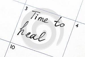 `time to heal` text write on calendar