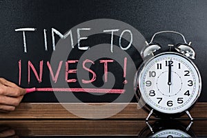 Time To Invest Concept Written On Blackboard