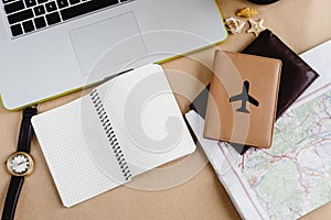 Time to plan travel concept, stylish notebook map watch and pass