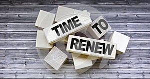 time to renew text on cubes background