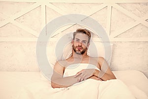 Time to rest. morning erection concept. asleep and awake. Relaxing in bedroom. energy and tiredness. sexy man in bed