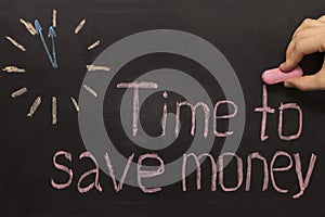 Time to save money - clock with text on black