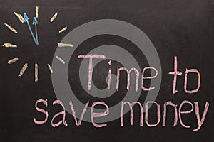 Time to save money - clock with text on black