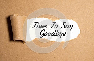 Time to say goodbye text on brown envelope