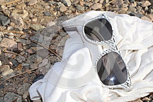 Time to take a vacation! White sunglasses are chic for summertime fashions!