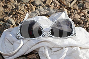 Time to take a vacation! White sunglasses are chic for summertime fashions!