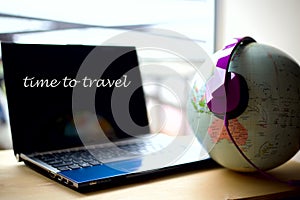 Time to travel text on PC screen. Travel concept.