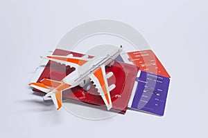 Time to travel. Tourism concept with airplane, boarding tickets and passport