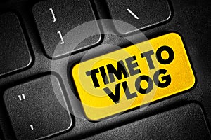 Time to Vlog text button on keyboard, concept background