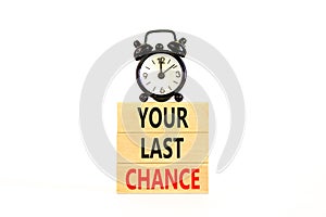 Time to your last chance symbol. Concept words Your last chance on wooden blocks on a beautiful white table white background.