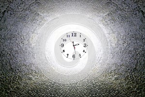 Time Tunnel. Clock in exit or end of tunnel