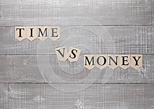 Time vs money paper letters symbol motivation sign