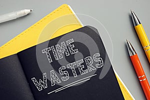 TIME WASTERS sign on the sheet. A person who either consciously or unconsciously tries to engage you in a fruitless investment of