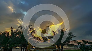 timelapse amazing clouds in sunset above the Dragon sculpture at Karon beach Phuket