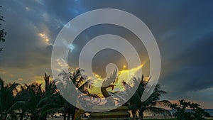 timelapse amazing clouds in sunset above the Dragon sculpture at Karon beach Phuket