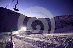 Timelapse of building up a Snowpark during sunset in St.Anton am Arlberg, Austria.