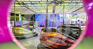 Timelapse of bumper cars motion blurring at carnival