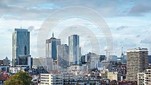 Timelapse of a business and economical center, with modern buildings or towers.