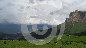 Timelapse of clouds and the Caucasus Mountains at the Aktoprak pass in Russia