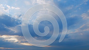 Clouds in different shades. Clouds during sunset. Panoramic view. Timelapse.