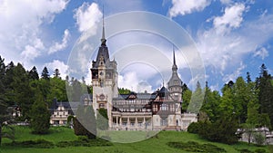Timelapse of clouds over Peles castle in Sinaia, Romania, during Spring. Popular sightseeing destination, tourism, architecture