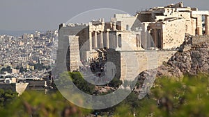 Timelapse of crowded entrance of Acropolis of Athens, Greece. Many tourists in the Parthenon Temple.