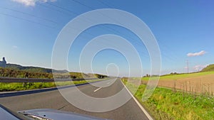 Timelapse driving car small village road, blue sky, summer ride