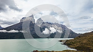 Timelapse of Glacial Lake and Majestic Cuernos del Paine with Cloud Formation