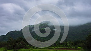 Timelapse - Monsoon storm coluds over a mountain 4K30