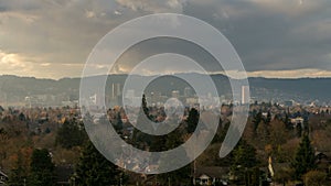 Timelapse of moving clouds and sky over downtown cityscape of Portland OR 4k UHD