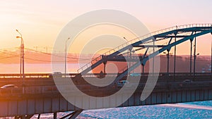 Timelapse panorama of transport on the bridge and sunrise over the Belaya River in Ufa, Bashkiria, Russia
