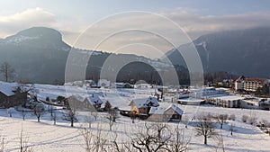 Timelapse of people sledging in the Swiss Alps. Mountains covered with snow. Morschach, Canton Schwyz