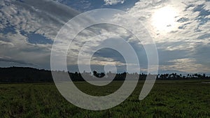 timelapse rice fields and clouds in the rural nature of masolo village