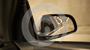 Timelapse Shot Of A Vehicle Getting Through An Empty Tunnel. View From A Cars Wing Mirror.