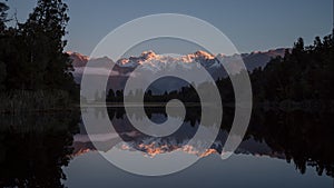 Timelapse of sunset on mt Cook at Lake Matheson