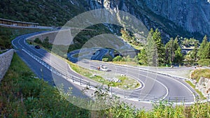 Timelapse traffic on a road in mountains. Schoellenen Schlucht. Andermatt. Switzerland