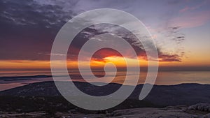 Timelapse video of a sunrise from a mountaintop