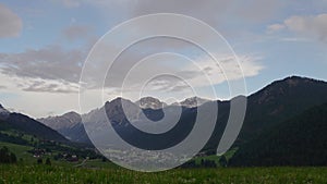 Timelapse view of clouds moving over mountains