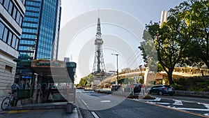 timelapse view of street with traffic leads to Nagoya TV tower,a tourist famous attraction landmark of Nagoya city