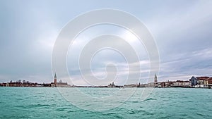 Timelapse of water taxis and buses traffic in front of San Marco Square in Laguna Veneta Venice Italy 4K