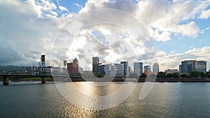 Timelapse of white clouds over downtown city skyline along Willamette River in Portland Oregon 4k uhd