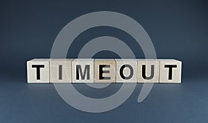 Timeout. Cubes form the word Timeout. Extensive Timeout concept