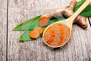 Turmeric powder , herbal spice medicine plant photo