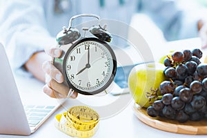 Times to Healthcare or Diet Food advisor show clock for timing care your health concept