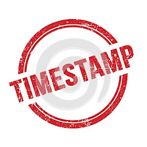TIMESTAMP text written on red grungy round stamp
