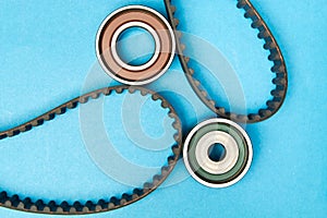 Timing belt with rollers on background .Kit of timing belt for car engine