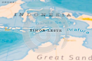 Timor-Leste in Focus on a Tilted World Map.