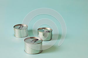 Tin can against light blue background