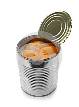 Tin can with conserved peach halves