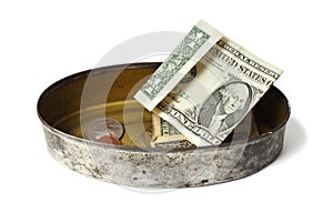 Tin can with money